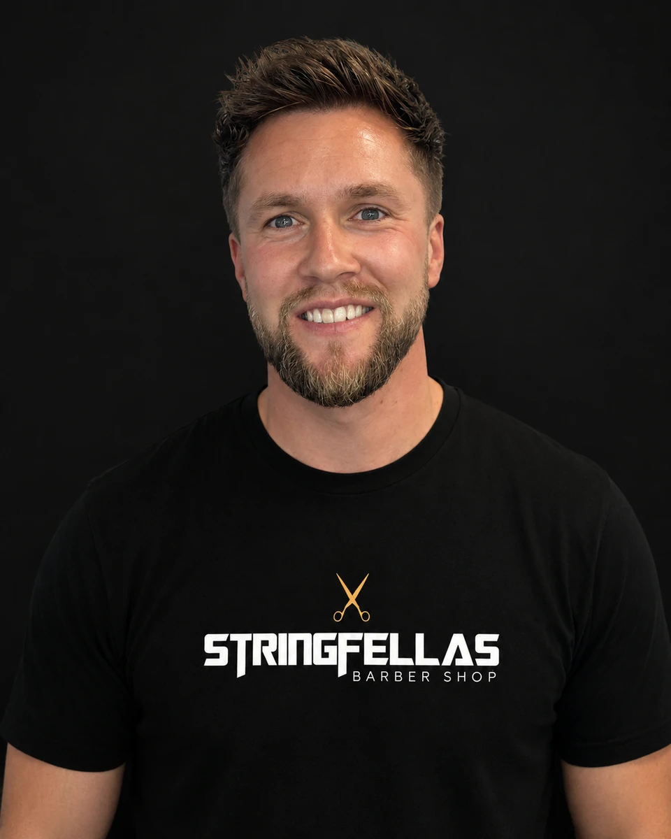 Bill, senior barber at Stringfellas